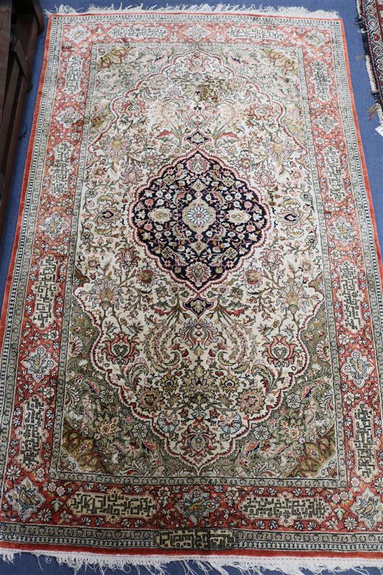 A Persian ivory ground foliate medallion rug, 176cm x 104cm
